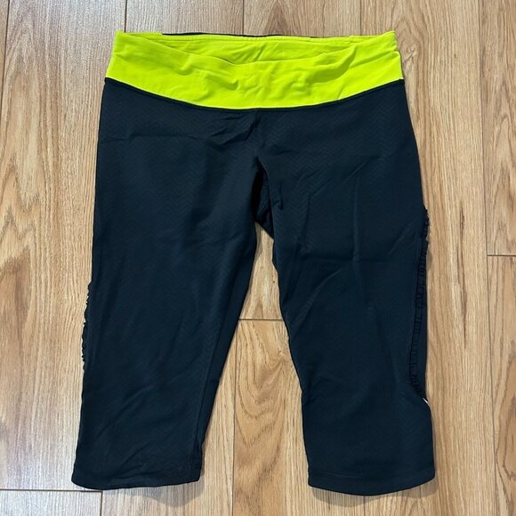 Lululemon Run Fast Free Crop Capri Leggings Womens 10 Ruffle Black Neon Yellow - Picture 1 of 5